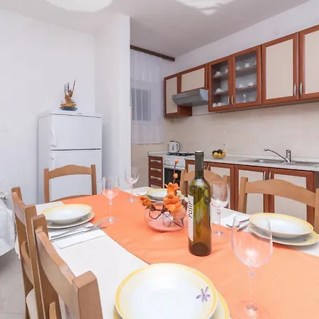 Vin * Traù